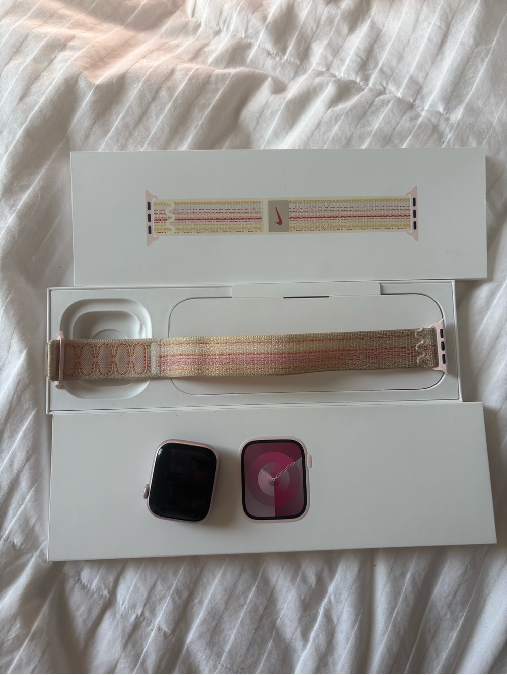 Apple Pink Smartwatch with Pink and Cream Nike Woven Sport Loop